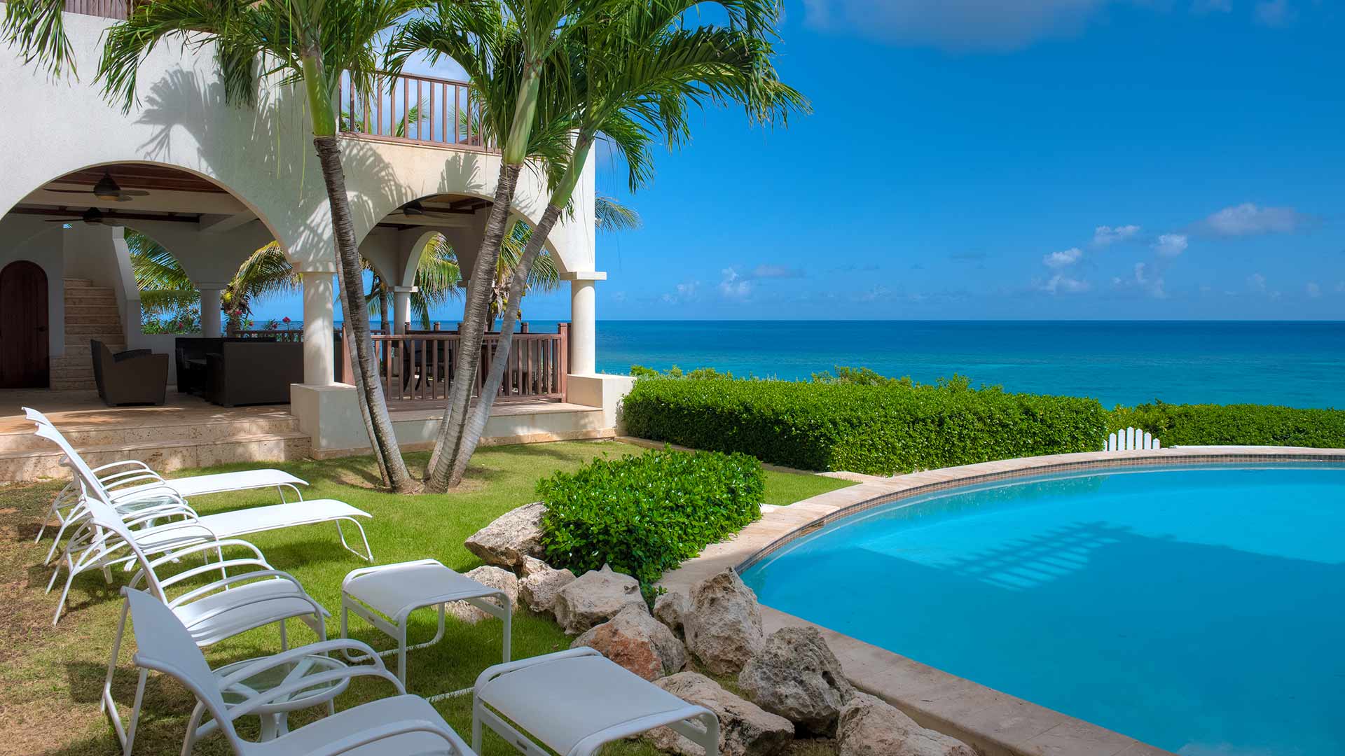 Black Pearl offers seating by the pool, on the patio or on a beach deck.
