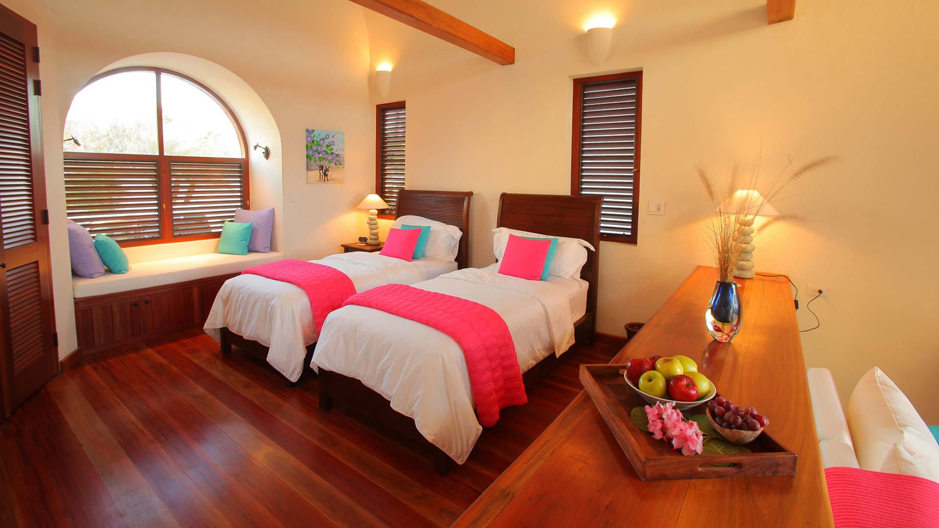 A suite with two double beds at Black Pearl.